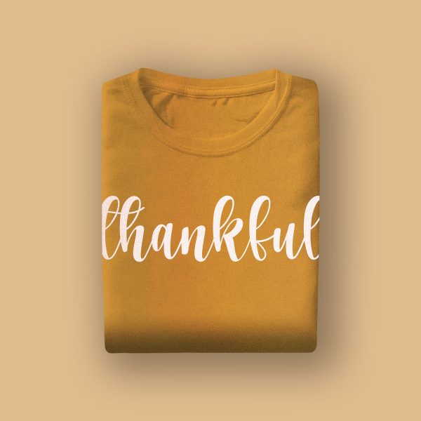 Camiseta con estampado verde azulado de tipografía